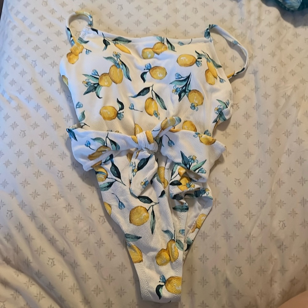 Jessica Simpson women’s whole piece swim suit. Cheeky bottoms.